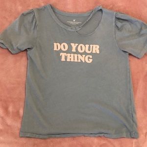 Blue shirt , rips, ruffles, writing, pink